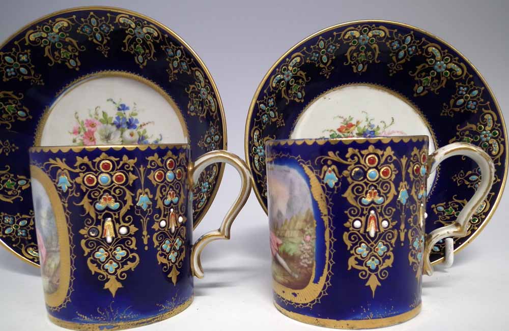 Two Sevres coffee cans and saucers, painted with floral sprays and figures within landscapes, - Image 4 of 15