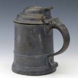 18th century pewter tankard with touchmarks and a crowned WR, height 17cm (soldered repair at