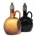 Amber and ruby glass decanters, with loop handles fitted with silver plated mounted cork stoppers,