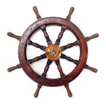 Teak ships wheel, eight turned spokes with central being boss, 90cm (35") diameter, removed from tug