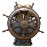 Steering hub or helm station manufactured by Brown Bros. Company, Edinburgh, ships wheels attached