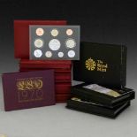 Five United Kingdom red leatherette proof coin sets, 2001, 2002, 2003, 2005, 2006; three United