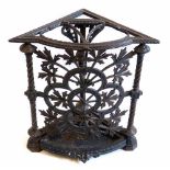 Late Victorian Arts & Crafts design cast iron corner walking cane stand, top frame supported by