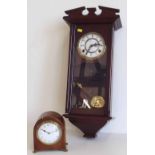 Small Edwardian mahogany mantel clock with brass feet and modern 8 day 'Timemaster' reproduction