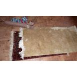 Afgan rug, fringed rug and draught excluders Condition report: see terms and conditions