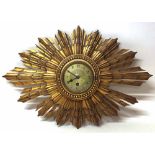 19th century gilt starburst wall clock Condition report: see terms and conditions