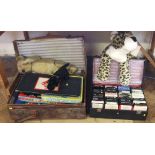 Suitcase of vintage board games, also a case of eight track casettes and 2 soft toys Condition