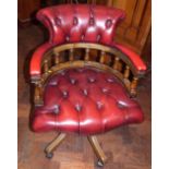 Reproduction revolving office chair with ox blood button back and seat Condition report: see terms