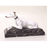 Staffs porcelain greyhound on plinth Condition report: see terms and conditions