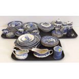 Quantity of blue and white china, mainly willow pattern from various factories. Condition report: