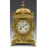 French cast brass rococo style mantel clock, late 19th century, the square section case moulded with