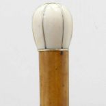 Malacca cane walking stick with a segmented ivory and gold wire hilt, remains of a hallmark,