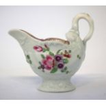 Worcester dolphin ewer or creamboat circa 1770, moulded shell body painted with floral sprays and