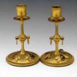 Pair of Aesthetic Movement gilt brass candlesticks by George Betjemann & Son, Rd. mark 1869, the