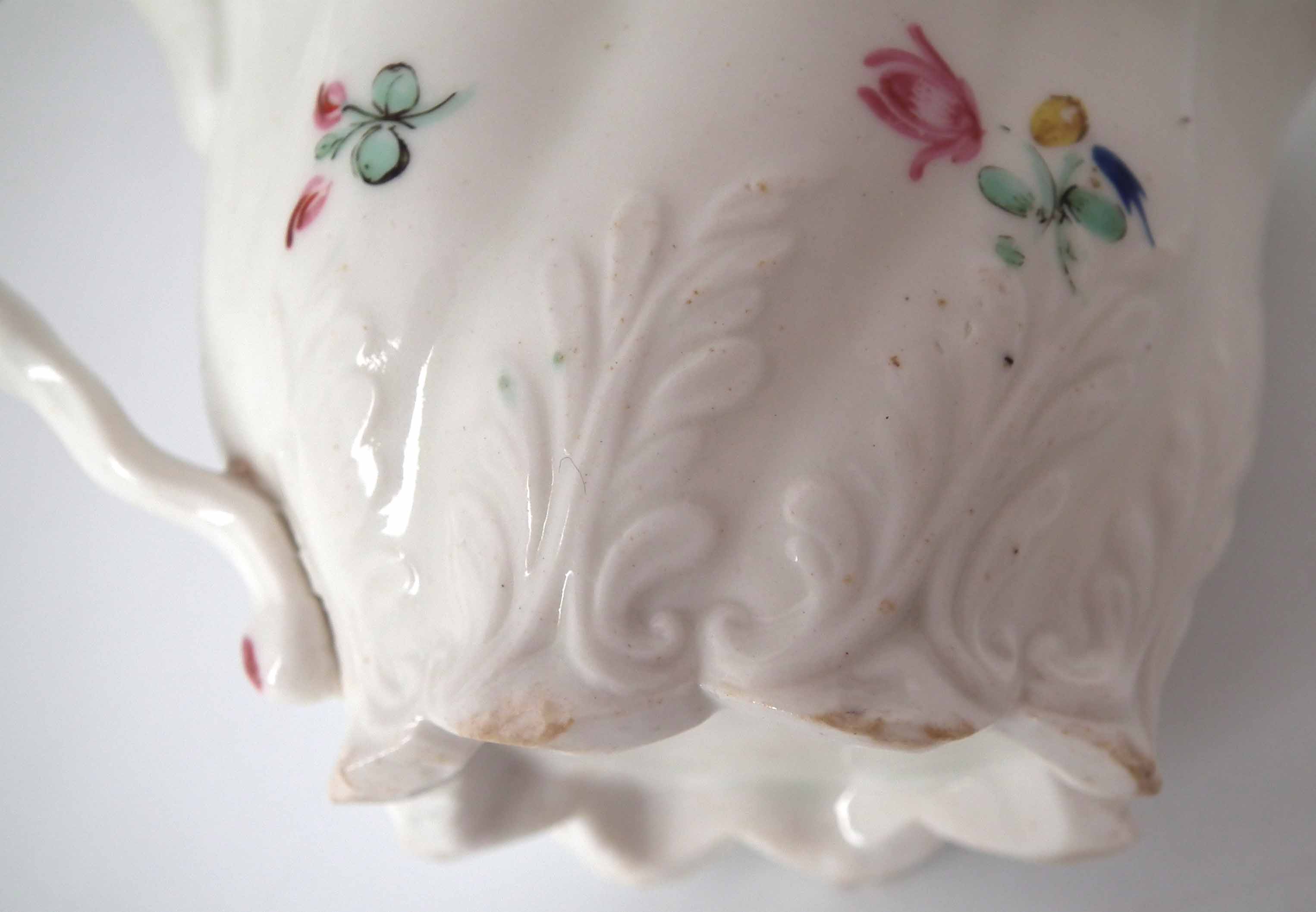 Caughley Low Chelsea Ewer circa 1790, painted with flora and moulded with acanthus leaves, 11cm wide - Image 5 of 6