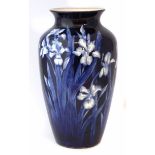 George Jones imperial ware vase, decorated with flowers on a deep blue ground, printed marks to