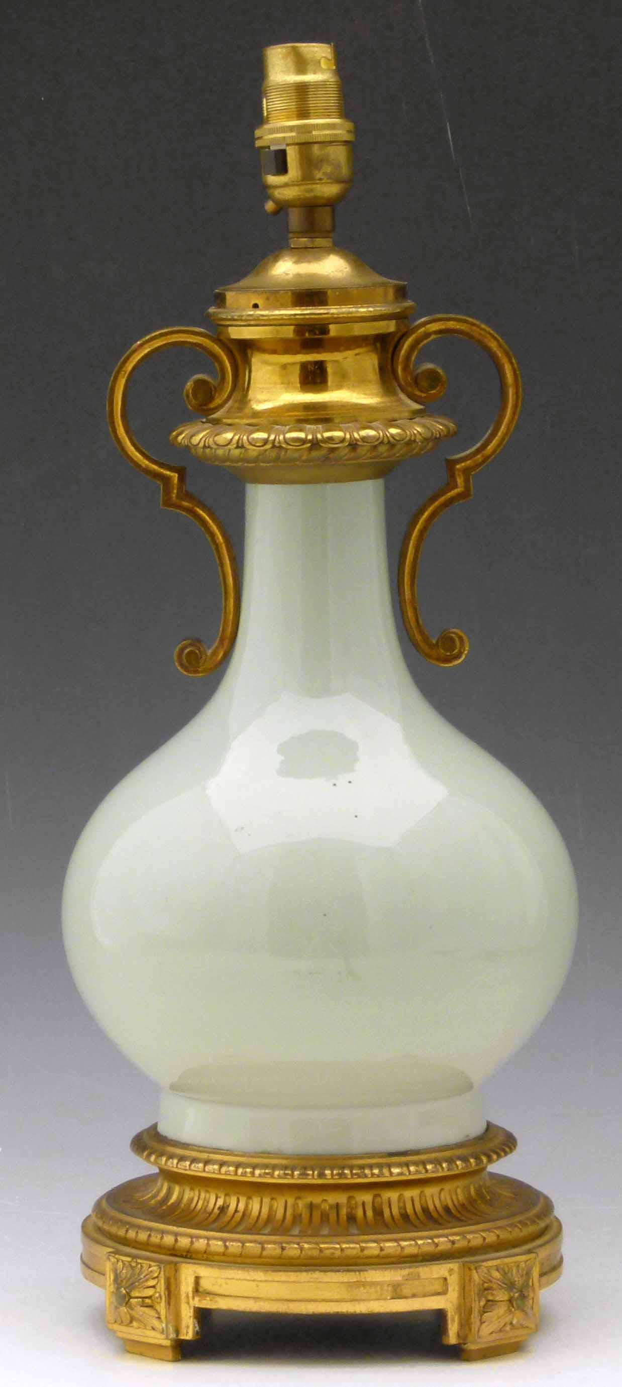 Chinese celadon bottle vase with European ormolu mounts as an electric table lamp, height to light