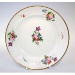 Swansea plate circa 1820, painted with scattered floral sprays, feint red printed mark to base, 21cm