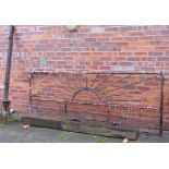 Metal gate with sunburst decoration,approx 9' wide, 3'4" tall Condition report: see terms and