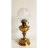 Victorian brass oil lamp with frosted glass shade. Condition report: see terms and conditions