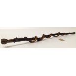 African walking stick with carved figure head and entwined snake decoration Condition report: see