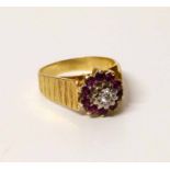 18ct gold ruby and diamond cluster ring. Condition report: see terms and conditions