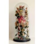 Victorian dried floral arrangement under glass dome. Condition report: see terms and conditions