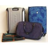 Luggage to include Tumi large hard wheeled suitcase, Tripp large canvas wheeled suitcase, Ricardo