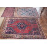 Three small Persian rugs. Condition report: see terms and conditions