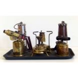 Two miner's lamps, Pri-mus burner and Burmos burner, Sievert blow lamp and another by Optimus