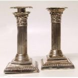 Pair of silver Corinthian column candlesticks. Condition report: see terms and conditions