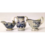 Two pearlware sauceboats and a cream jug. Condition report: see terms and conditions