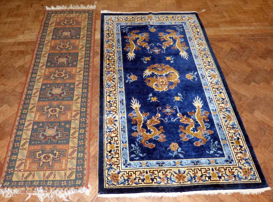 Chinese silk carpet, 215 x 121cm and one other runner. Condition report: see terms and conditions