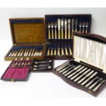 Six silver tea spoons, two cased boxes of dessert knives and forks etc. Condition report: see