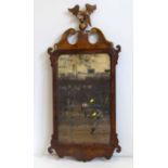 Queen Anne style walnut framed wall mirror, Ho Ho bird to pediment. Condition report: see terms