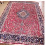 Fringed Persian style carpet 386 x 297cm. Condition report: see terms and conditions