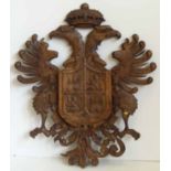 Heavily carved armorial crest. Condition report: see terms and conditions