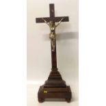 Crucifix with plated Jesus and wood base Condition report: see terms and conditions