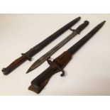 1907 Wilkinson S.M.L.E. bayonet, late 19th century Mauser bayonet and a WW1 Mauser bayonet Condition