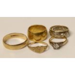 A 22ct gold band ring, a 9ct gold band ring, and 18ct gold and diamond solitaire ring (damaged), a