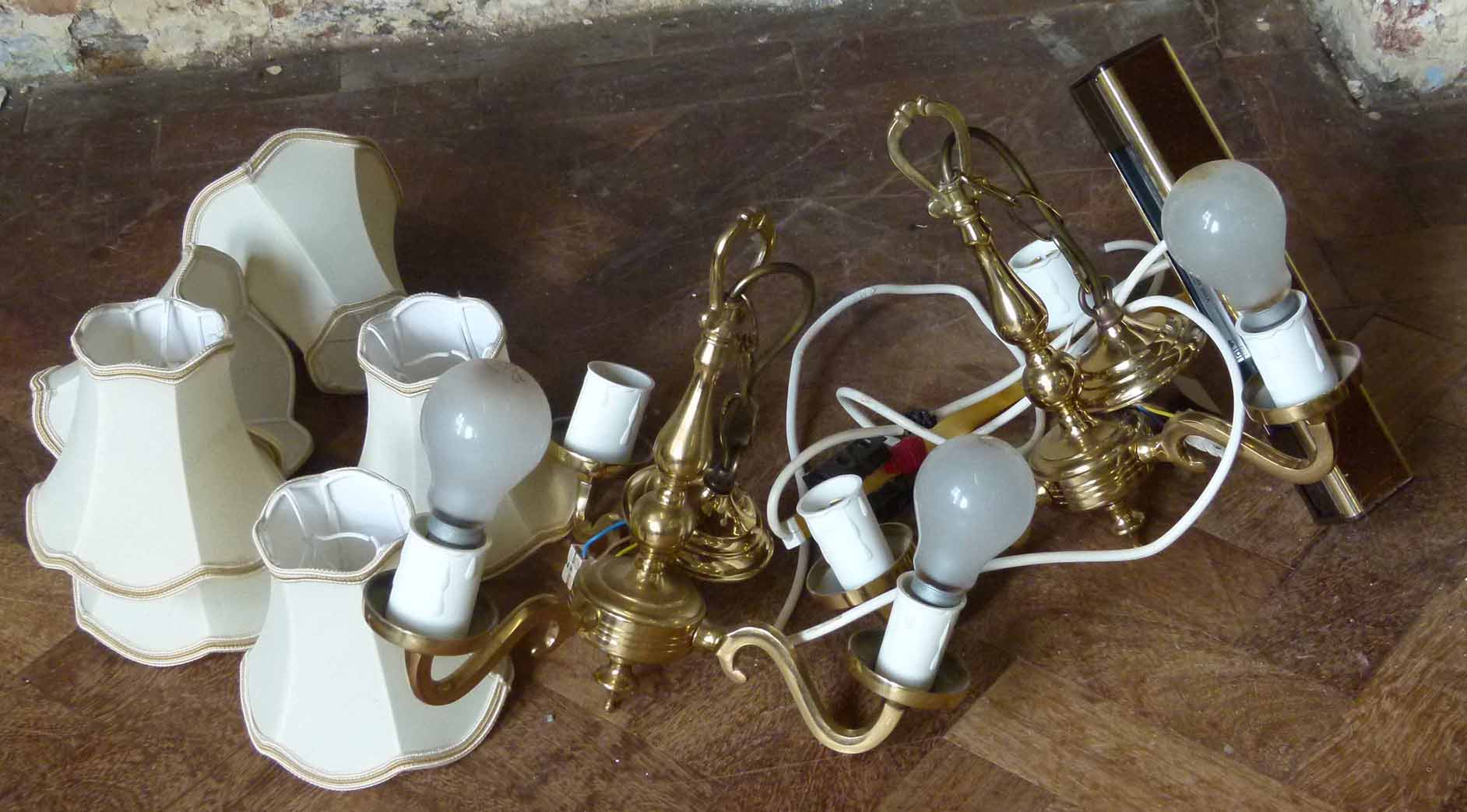 Two brass centre lights with three branches complete with shades and a picture light. Condition