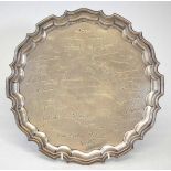 Silver presentation salver, of round form, piecrust edge, on three scroll feet, inscription for