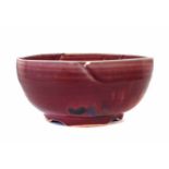 Kayo O' Young (Canadian, 1950-) bowl with five pointed edge, decorated with overall red and