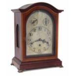 German mahogany cased bracket clock, with arched top cross banded and inlaid with satinwood,