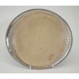 Silver salver of oval form piecrust border, embossed scroll sides, initialled, Birmingham 1898, 9oz.
