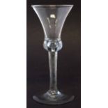 Wine glass circa 1760, bell shaped bowl, moulded twist stem and plain foot, 18cm high Condition