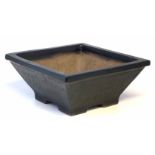 Lucie Rie (1902-1995) Bonsai pot, with four feet and black glazed exterior, monogram to base, 37cm