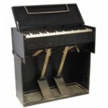 Folding pump organ, probably WW2 US Army, with four octave keyboard, the outside of the case has a