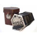 Charles Jeffries 39 key concertina, with pierced metal endplates stamped 'C Jeffries Maker' on black