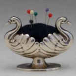 Silver pin cushion in the form of two opposing swans, Hilliard & Thomason, Birmingham 1896, width